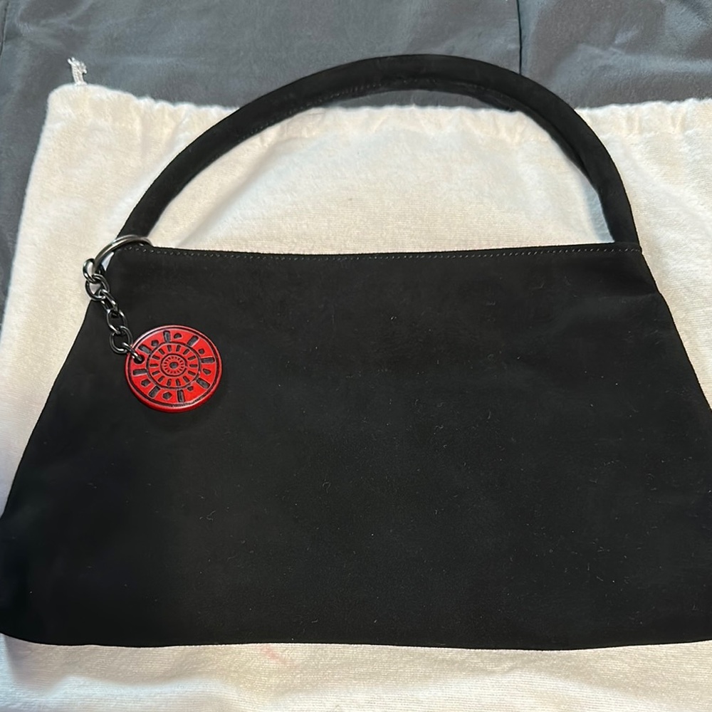Black Handbag with Red Accent